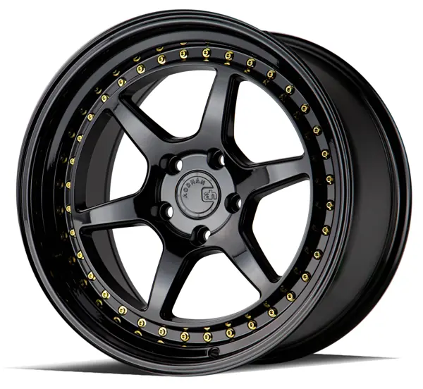 AodHan DS09 wheel in Gloss Black w/Gold Rivets